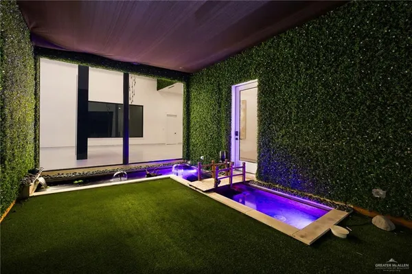 a view of an outdoor space with porch and patio