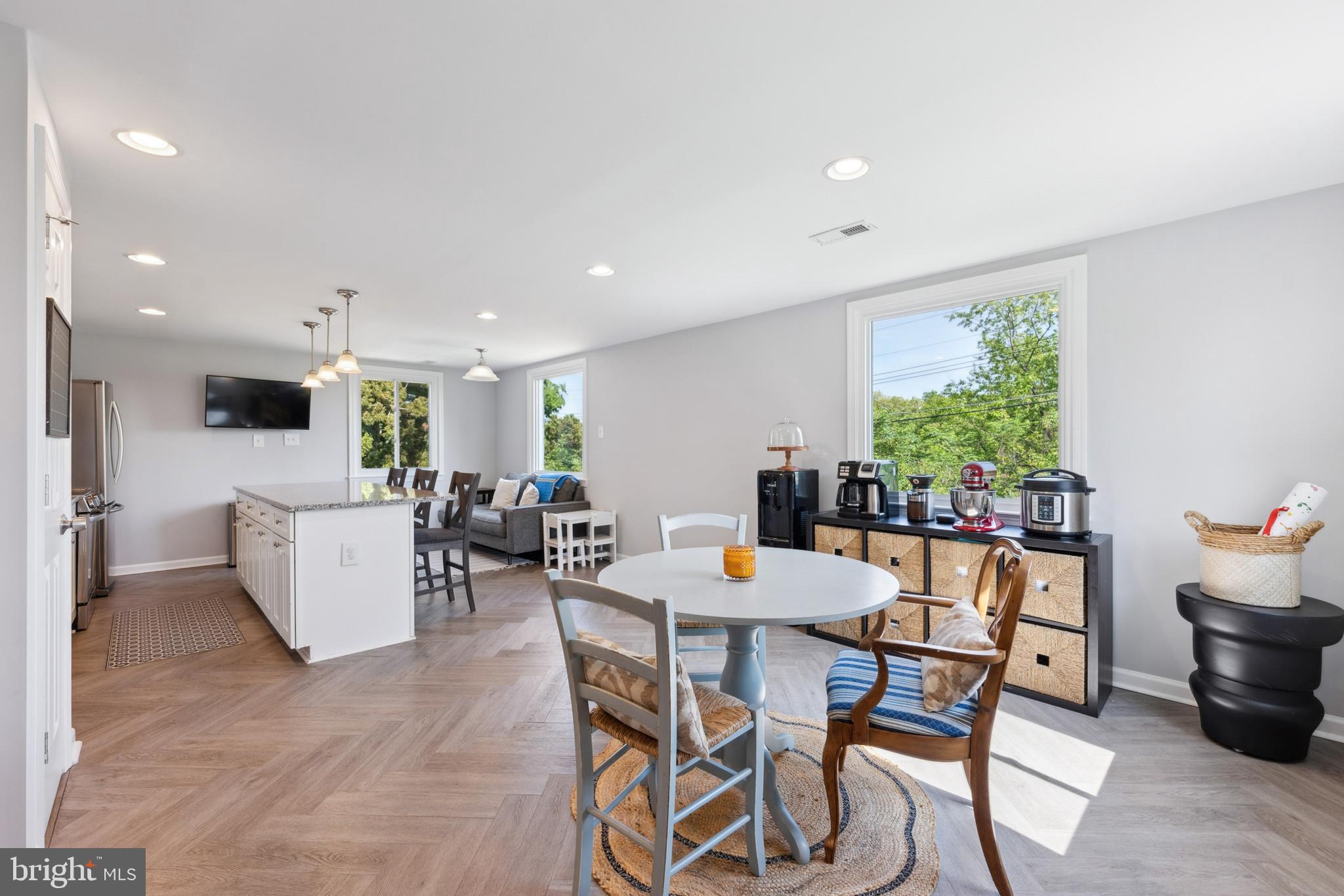 516 Epsom Road Towson, MD 21286 - Photo 5 of 11 a view of a dining room with furniture window and wooden floor