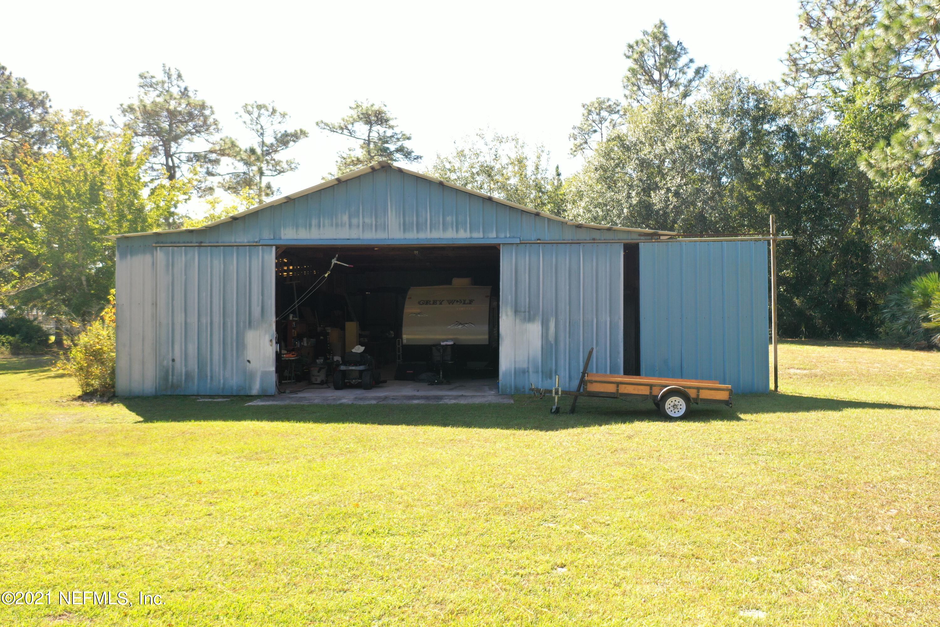 2210 Chaffee Road South Jacksonville, FL 32221 - Photo 13 of 17 a view of swimming pool with patio
