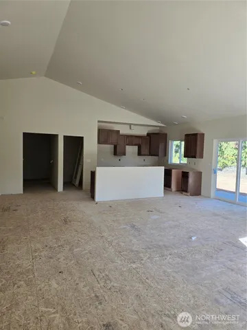 a large room with furniture and window