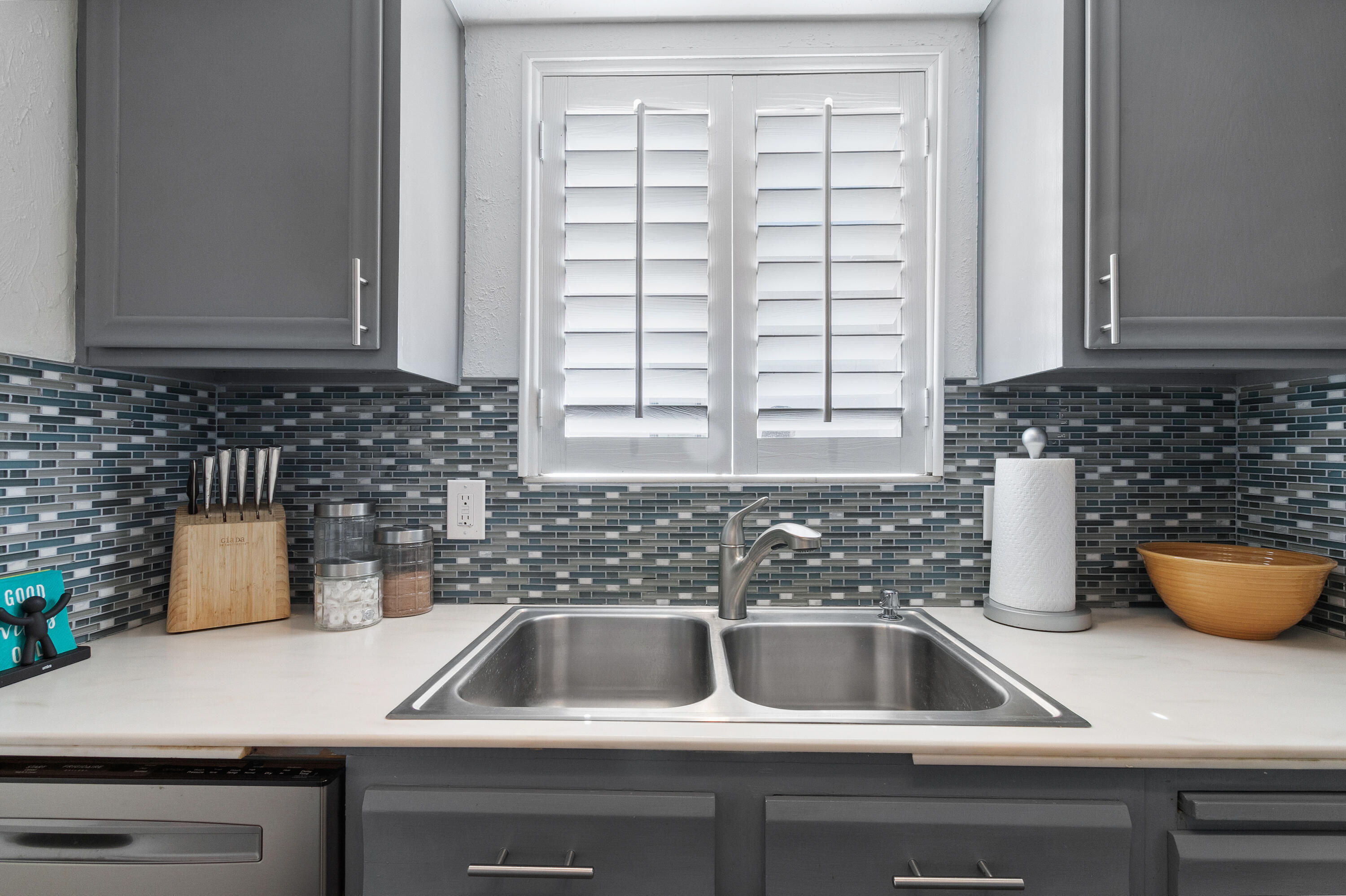1050 Ramon Road, Unit 128 Palm Springs, CA 92264 - Photo 14 of 35 a kitchen with a sink and a window