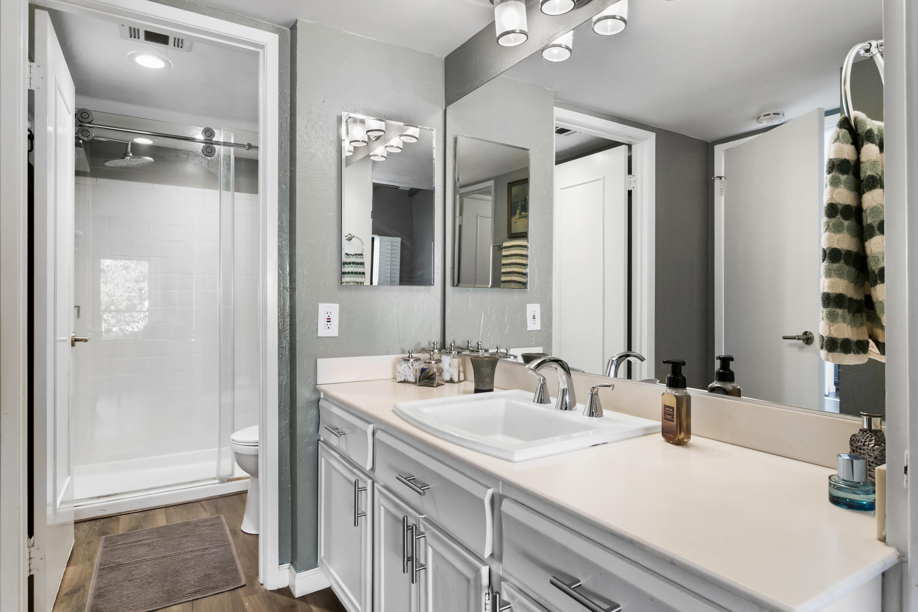 1050 Ramon Road, Unit 128 Palm Springs, CA 92264 - Photo 21 of 35 a bathroom with a sink double vanity and a shower