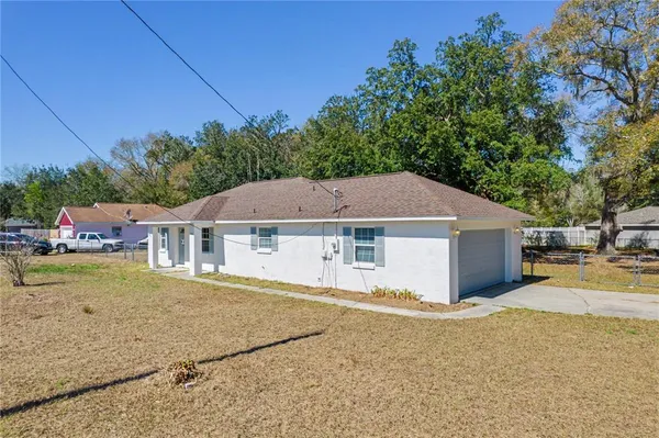 front view of house next to a road