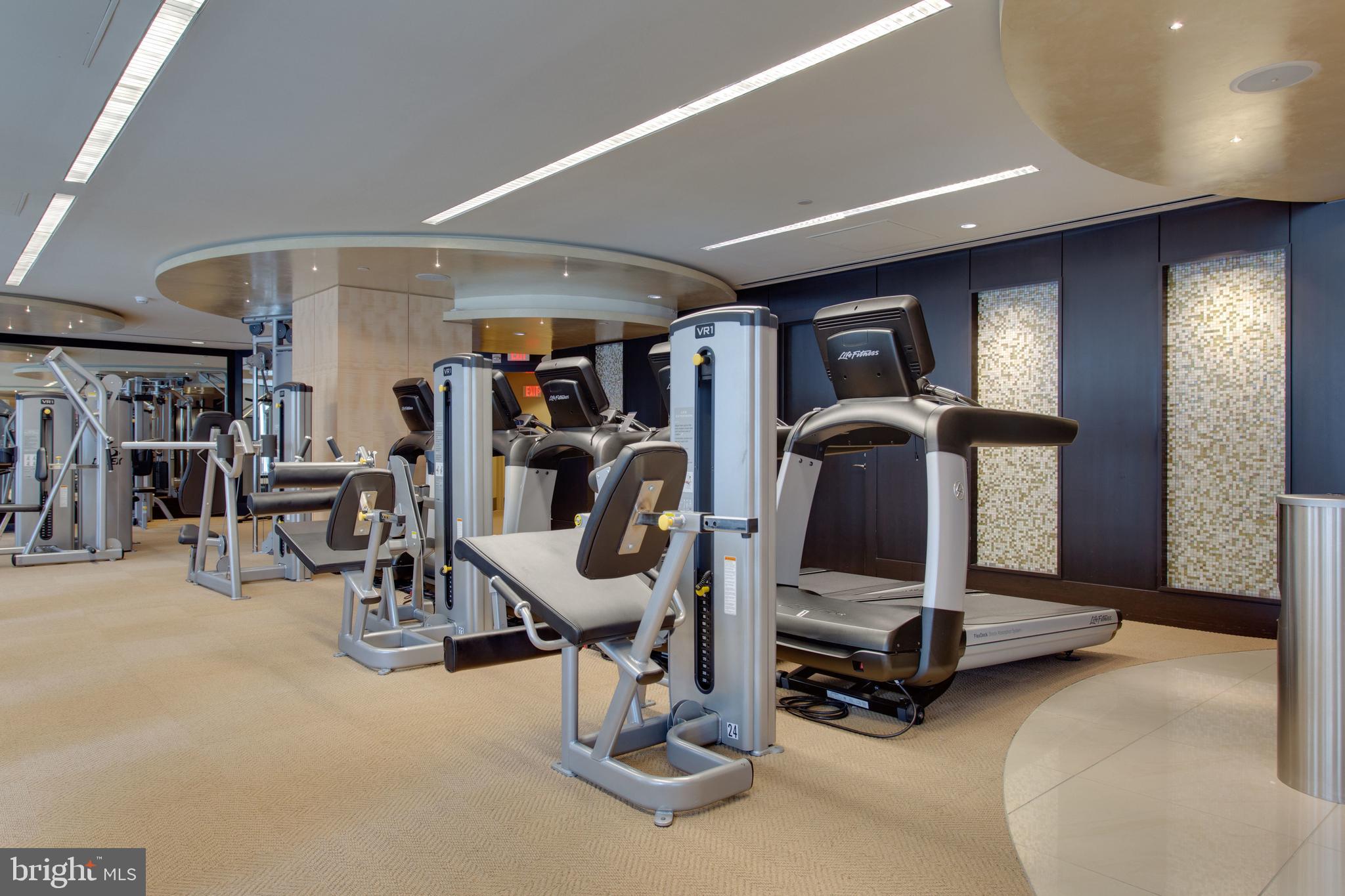 1111 19th Street North, Unit 1706 Arlington, VA 22209 - Photo 12 of 15 a view of a room with gym equipment