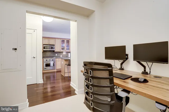 a view of a workspace with furniture