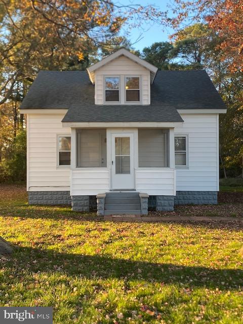 23484 Deal Island Road Deal Island, MD 21821 - Photo 1 of 25 a front view of a house with a yard