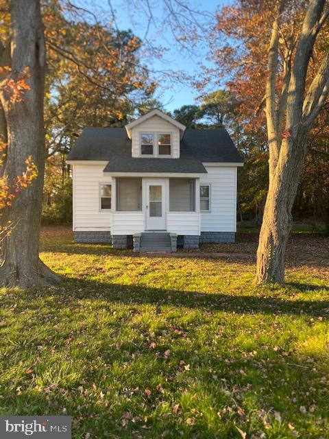 23484 Deal Island Road Deal Island, MD 21821 - Photo 2 of 25 a view of a house with a yard