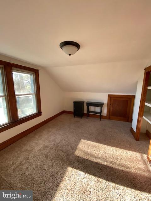 23484 Deal Island Road Deal Island, MD 21821 - Photo 11 of 25 a view of furniture and windows in an empty room