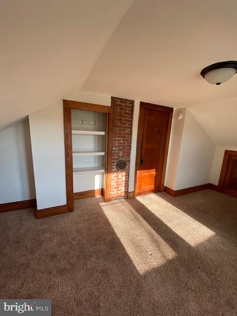 23484 Deal Island Road Deal Island, MD 21821 - Photo 13 of 25 a view of an empty room with a fireplace and a window
