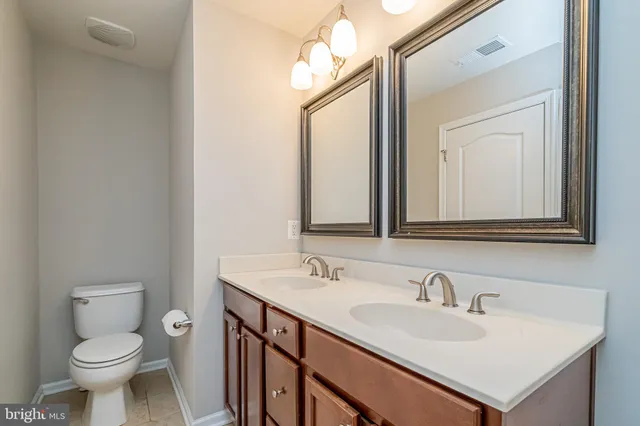 a view of a room with shelf on the wall