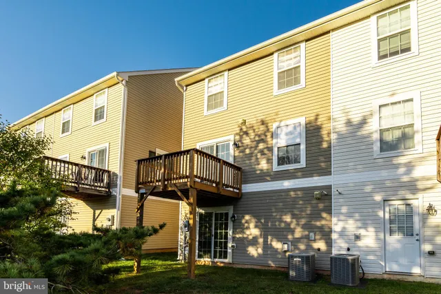 a view of a street with a building in the background