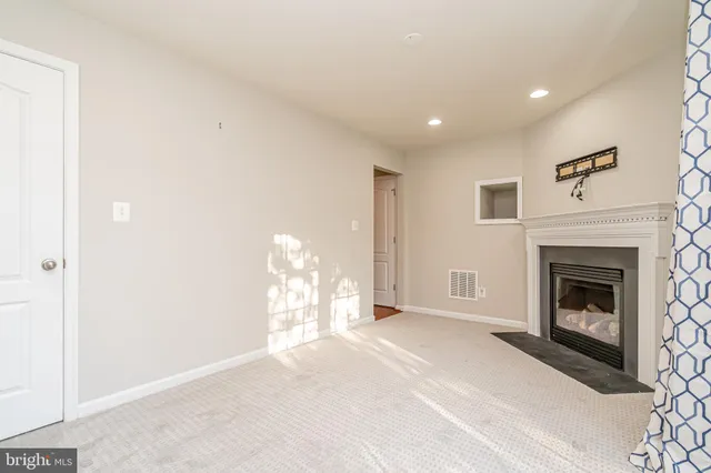 a view of a livingroom with a fireplace