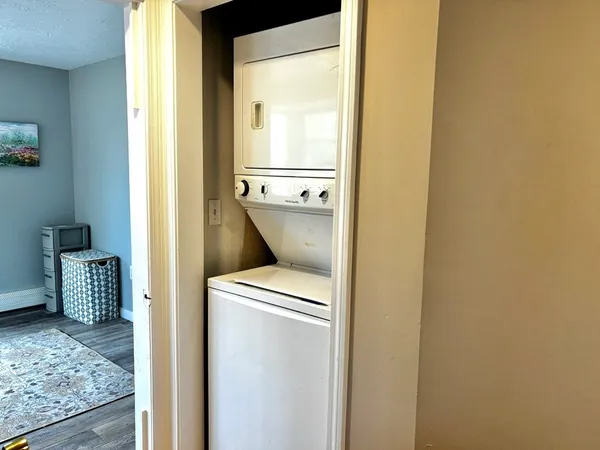 a view of living room with furniture and a flat screen tv