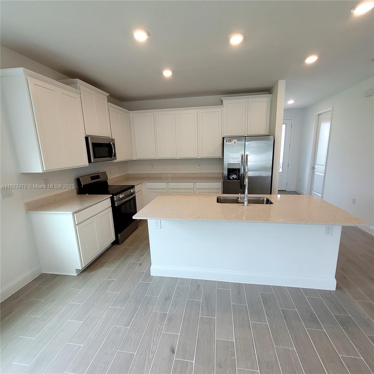 4155 Acoma Drive Ormond Beach, FL 32174 - Photo 22 of 49 a living room with granite countertop furniture and kitchen view