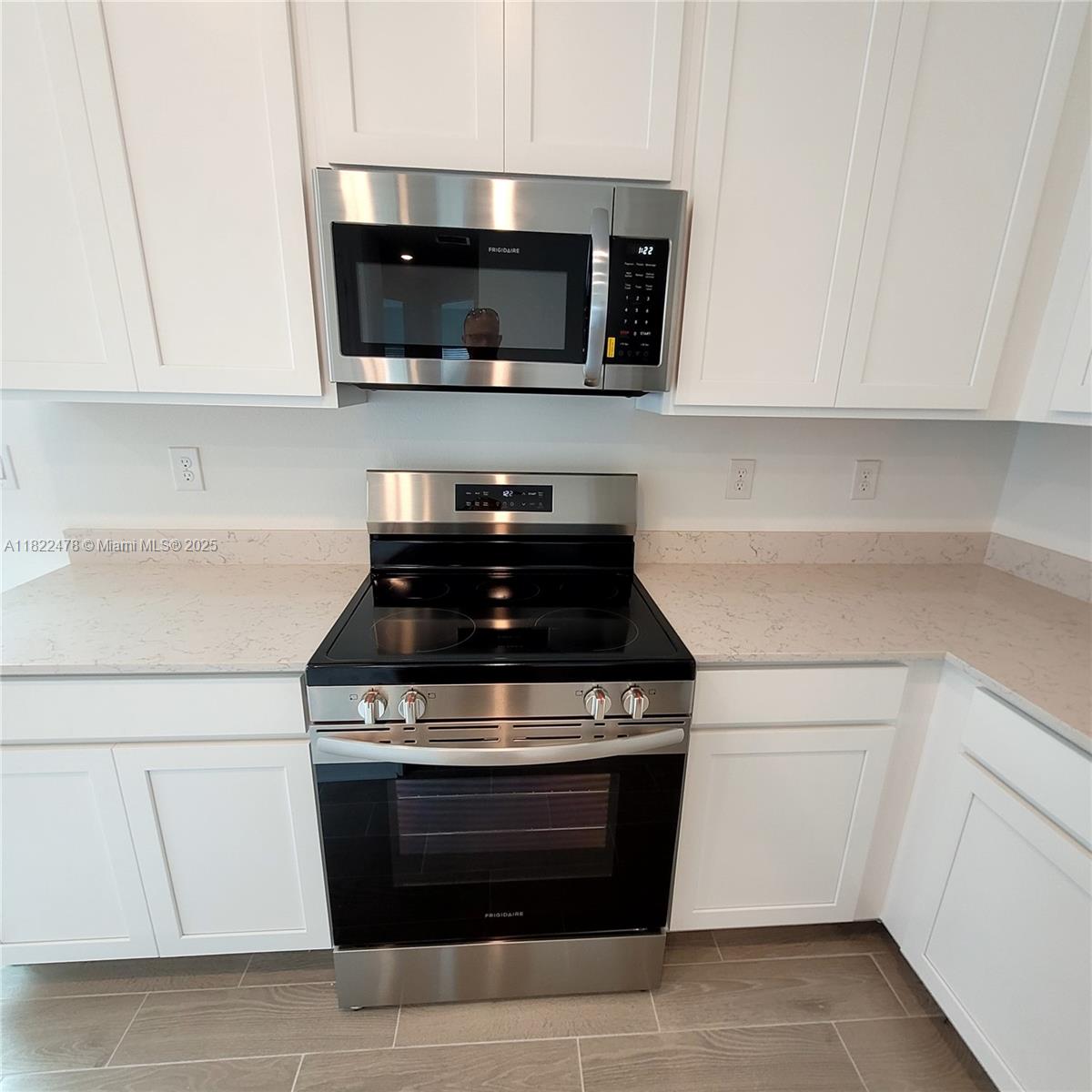 4155 Acoma Drive Ormond Beach, FL 32174 - Photo 24 of 49 a stove top oven sitting inside of a kitchen