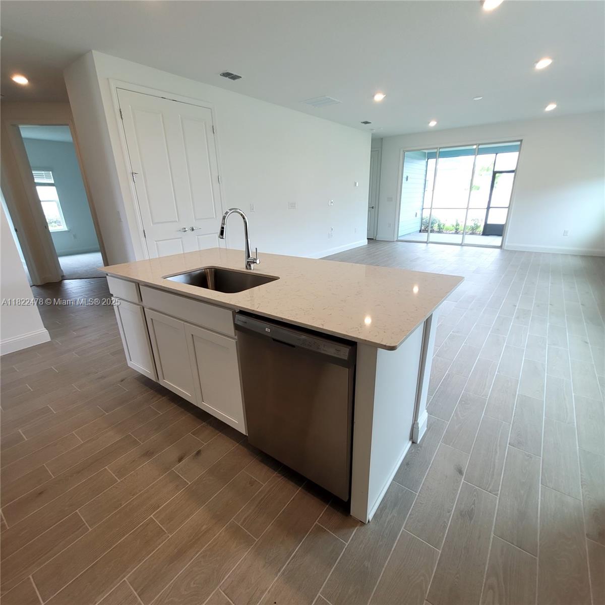 4155 Acoma Drive Ormond Beach, FL 32174 - Photo 25 of 49 a kitchen with sink and mirror