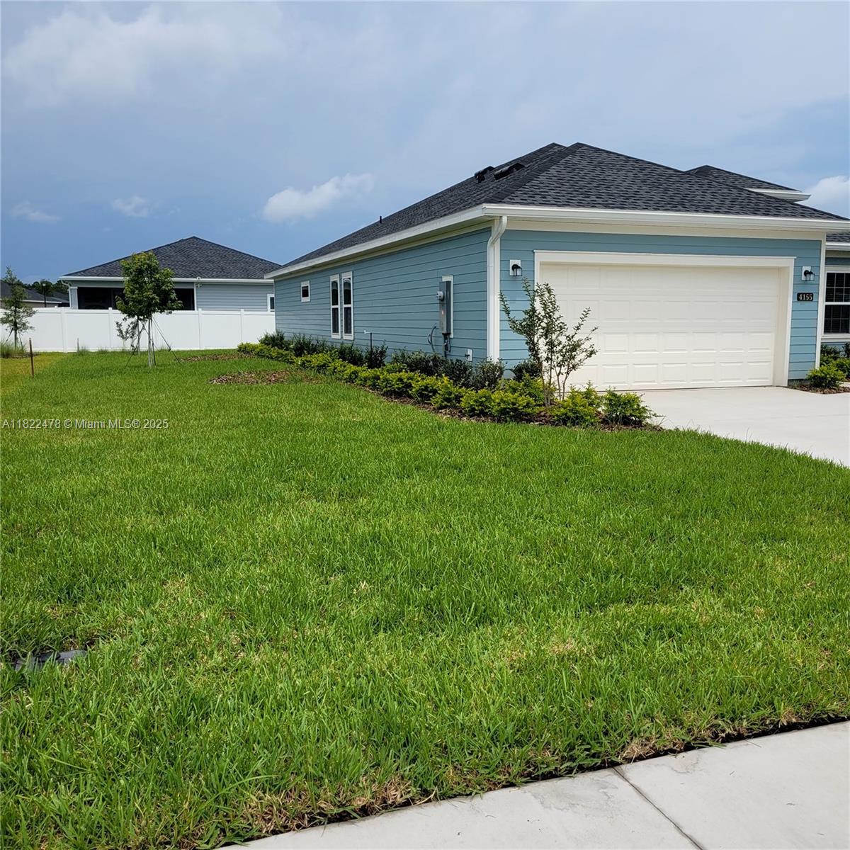 4155 Acoma Drive Ormond Beach, FL 32174 - Photo 3 of 49 a front view of house with yard and green space