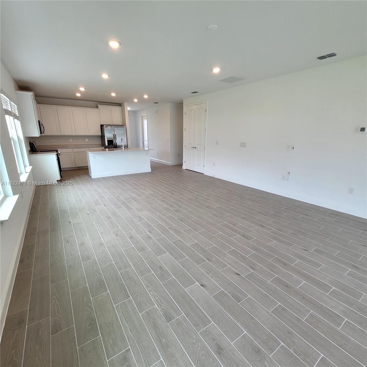 4155 Acoma Drive Ormond Beach, FL 32174 - Photo 33 of 49 a view of kitchen with kitchen island and stainless steel appliances