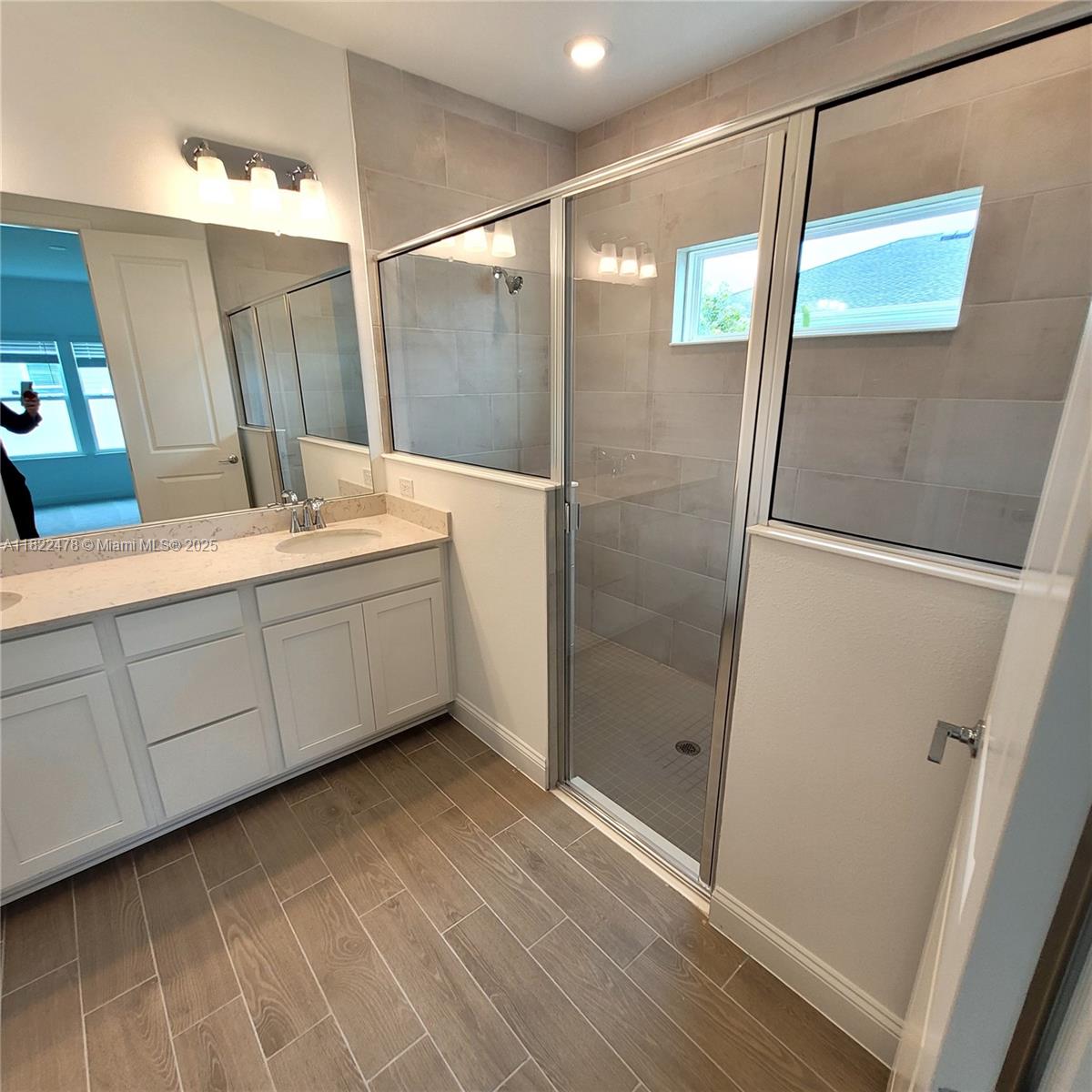 4155 Acoma Drive Ormond Beach, FL 32174 - Photo 39 of 49 a bathroom with a double vanity sink and mirror