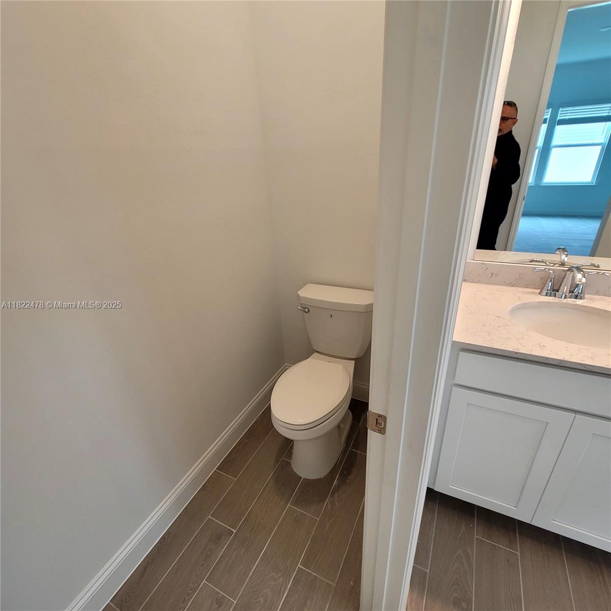 4155 Acoma Drive Ormond Beach, FL 32174 - Photo 40 of 49 a bathroom with a granite countertop toilet and a sink