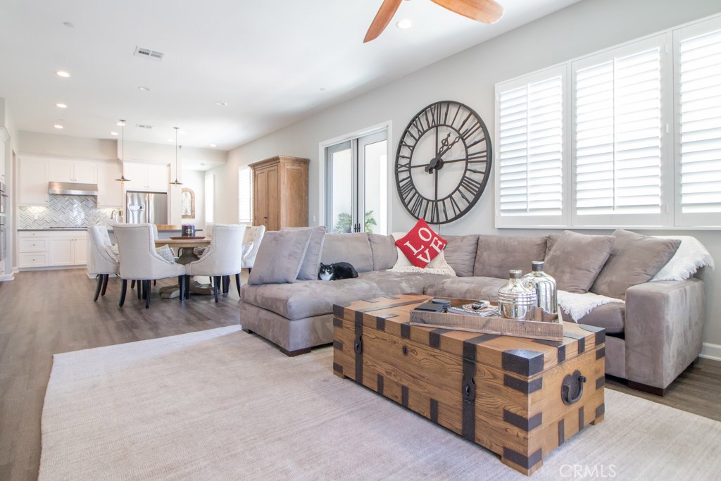 157 Follyhatch Irvine, CA 92618 - Photo 11 of 44 a bedroom with furniture and a large window