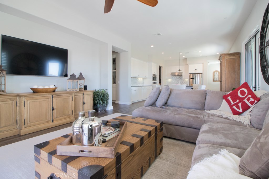 157 Follyhatch Irvine, CA 92618 - Photo 14 of 44 a living room with furniture and a flat screen tv