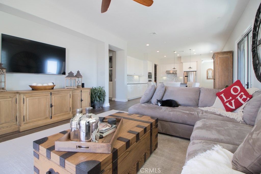 157 Follyhatch Irvine, CA 92618 - Photo 15 of 44 a living room with furniture and a flat screen tv