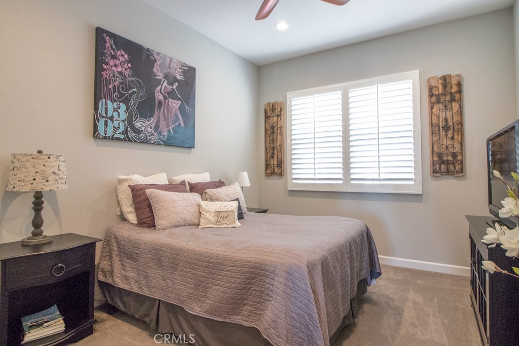 157 Follyhatch Irvine, CA 92618 - Photo 23 of 44 a bedroom with a bed and a window