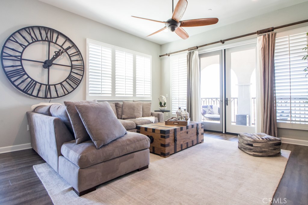 157 Follyhatch Irvine, CA 92618 - Photo 9 of 44 a living room with furniture and a large window