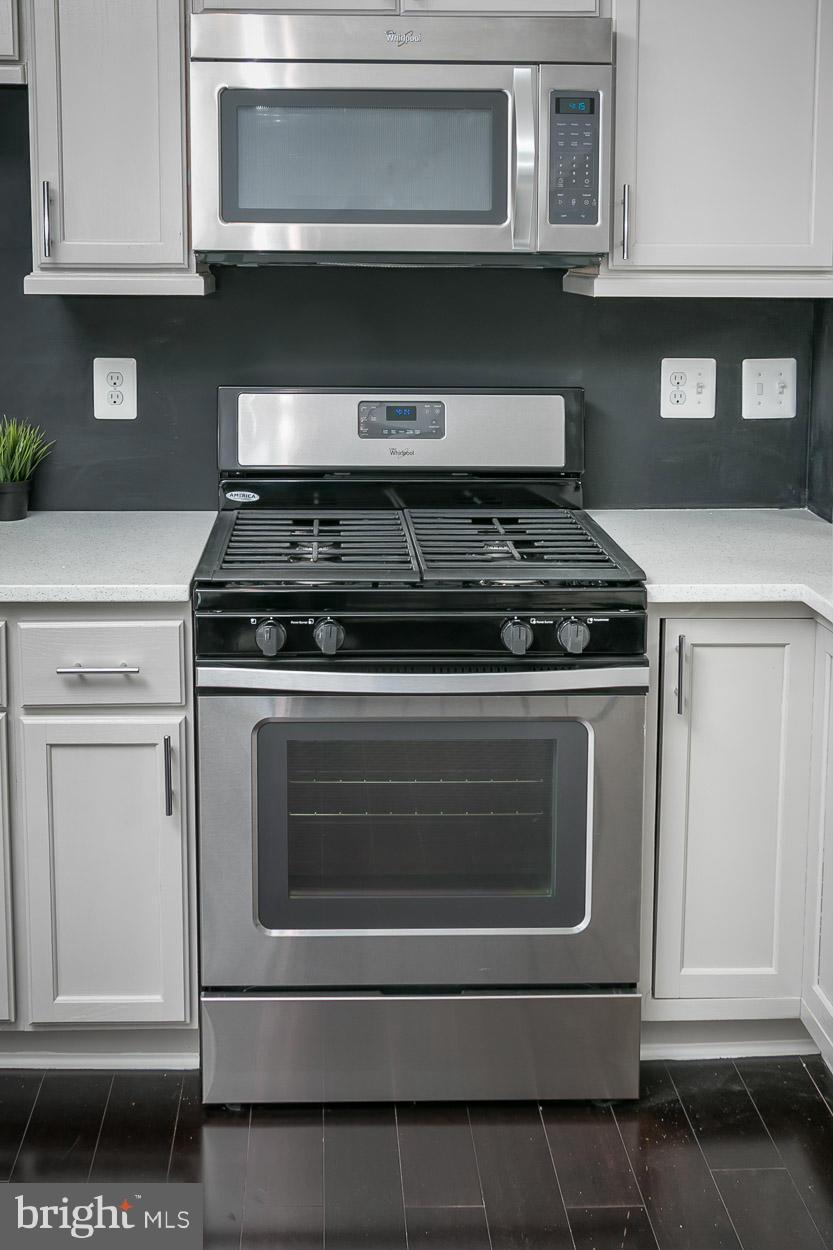 3 Cross Keys Road Baltimore, MD 21210 - Photo 12 of 29 a stove top oven sitting inside of a kitchen