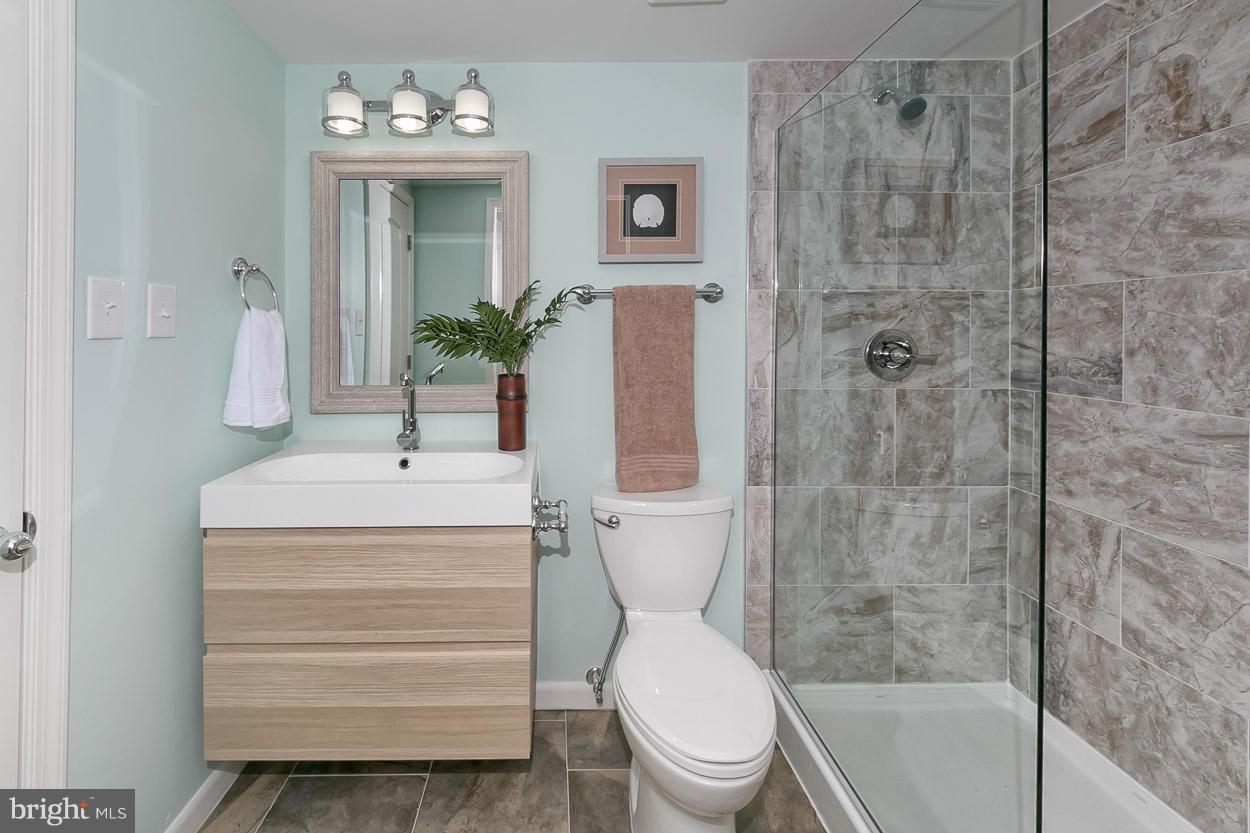 3 Cross Keys Road Baltimore, MD 21210 - Photo 18 of 29 a bathroom with a sink toilet and shower