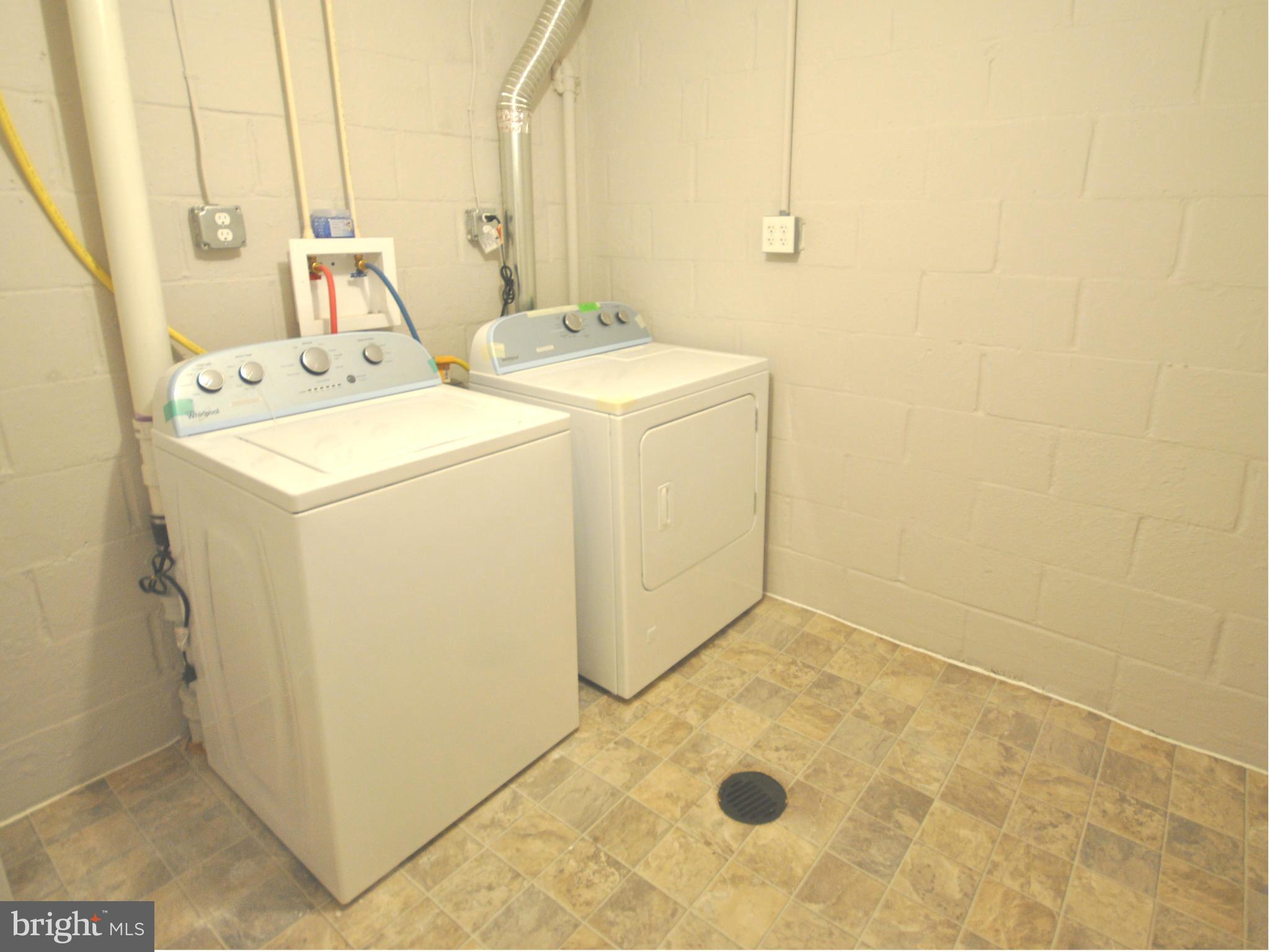 3 Cross Keys Road Baltimore, MD 21210 - Photo 24 of 29 a utility room with dryer and washer