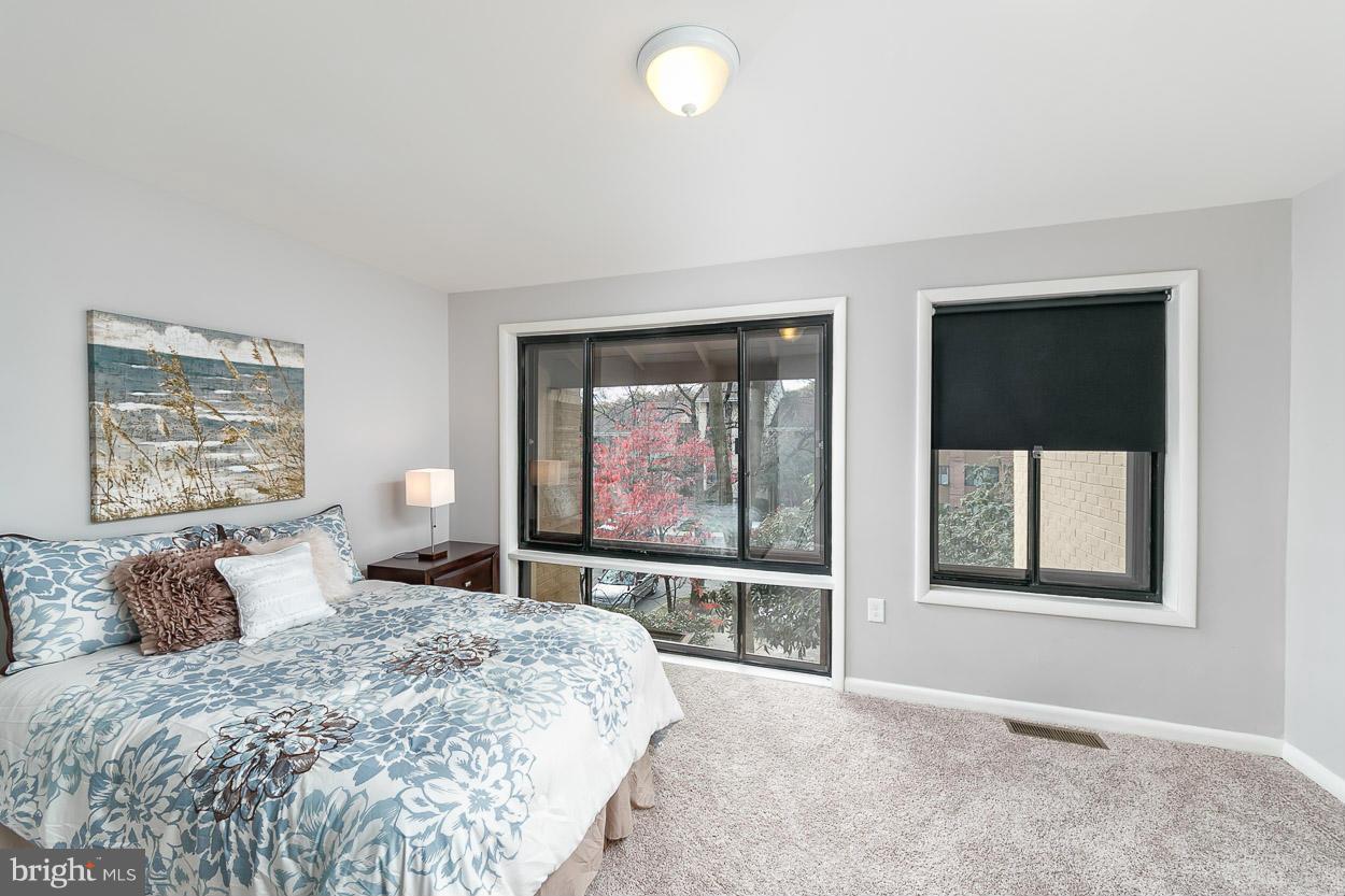3 Cross Keys Road Baltimore, MD 21210 - Photo 4 of 29 a bedroom with a bed and a large window