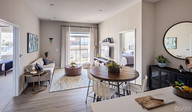 a bathroom with a double vanity sink mirror and shower