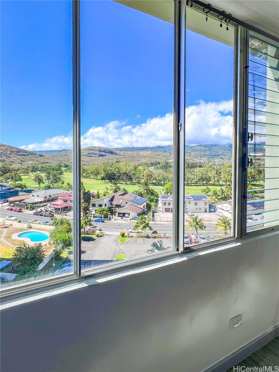 5210 Likini Street, Unit 901 Honolulu, HI 96818 - Photo 6 of 16 a view of a garden from a window