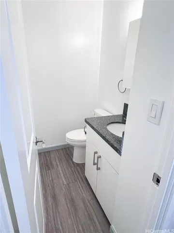 a bathroom with a sink and toilet