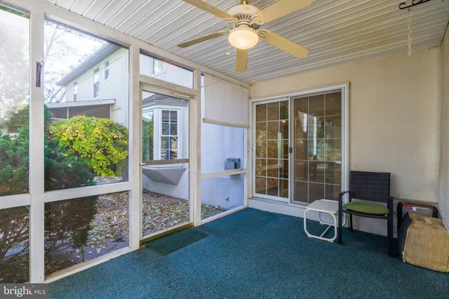 a view of a livingroom with furniture and front door