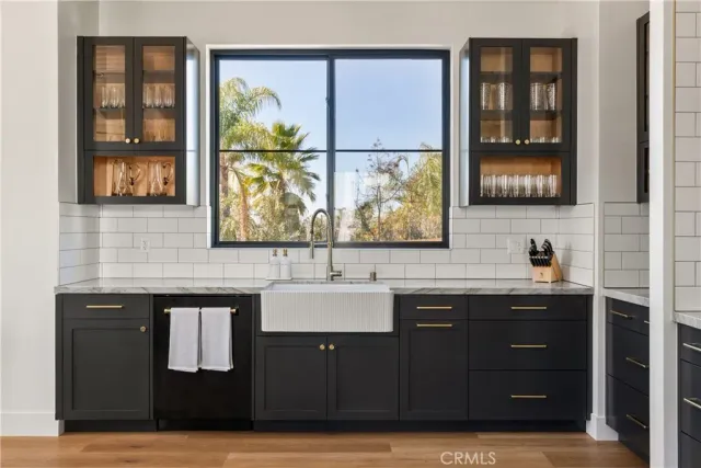 a view of a sink and a window