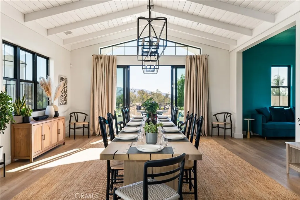 39241 Corte Venture Temecula, CA 92590 - Photo 14 of 49 a view of a dining room with furniture window and outside view