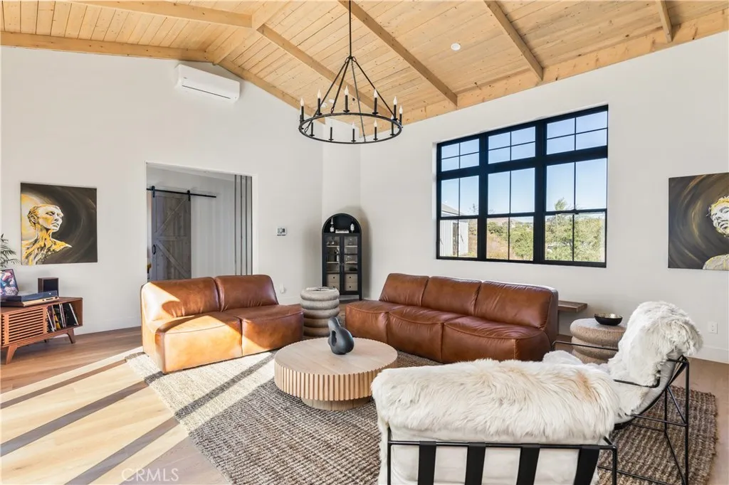 39241 Corte Venture Temecula, CA 92590 - Photo 18 of 49 a living room with furniture and a window
