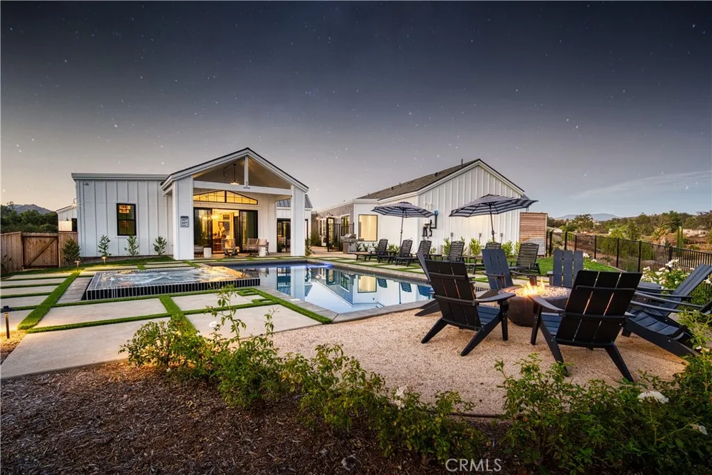 39241 Corte Venture Temecula, CA 92590 - Photo 48 of 49 a view of a house with swimming pool and sitting area