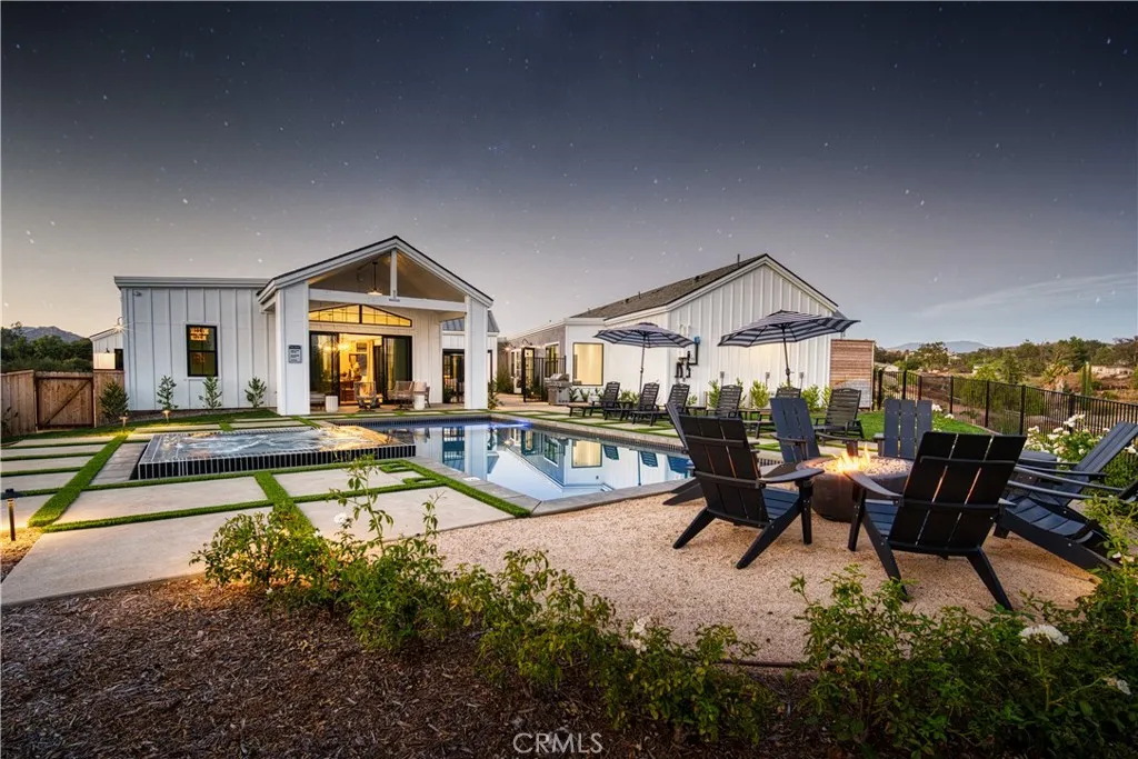 39241 Corte Venture Temecula, CA 92590 - Photo 48 of 49 a view of a house with swimming pool and sitting area