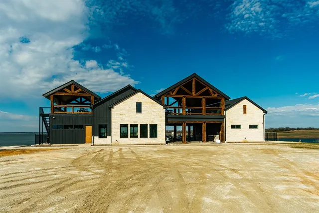 a front view of a house with a garage