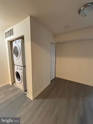 a view of a storage & utility room with washer and dryer