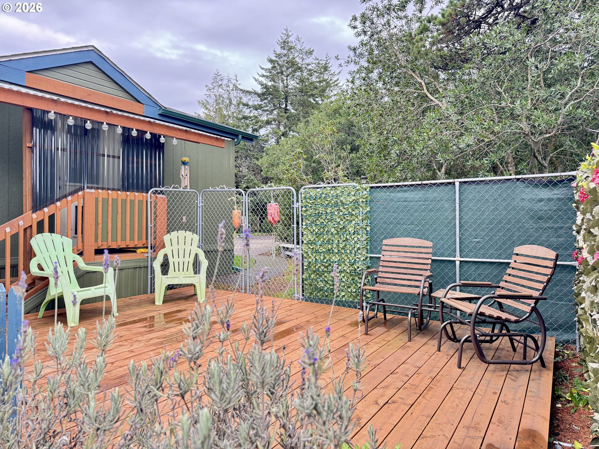 3760 Highway 101, Unit 1 Florence, OR 97439 - Photo 26 of 32 a view of a chairs and table in the patio