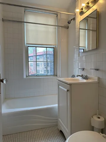 a bathroom with a sink and a bathtub