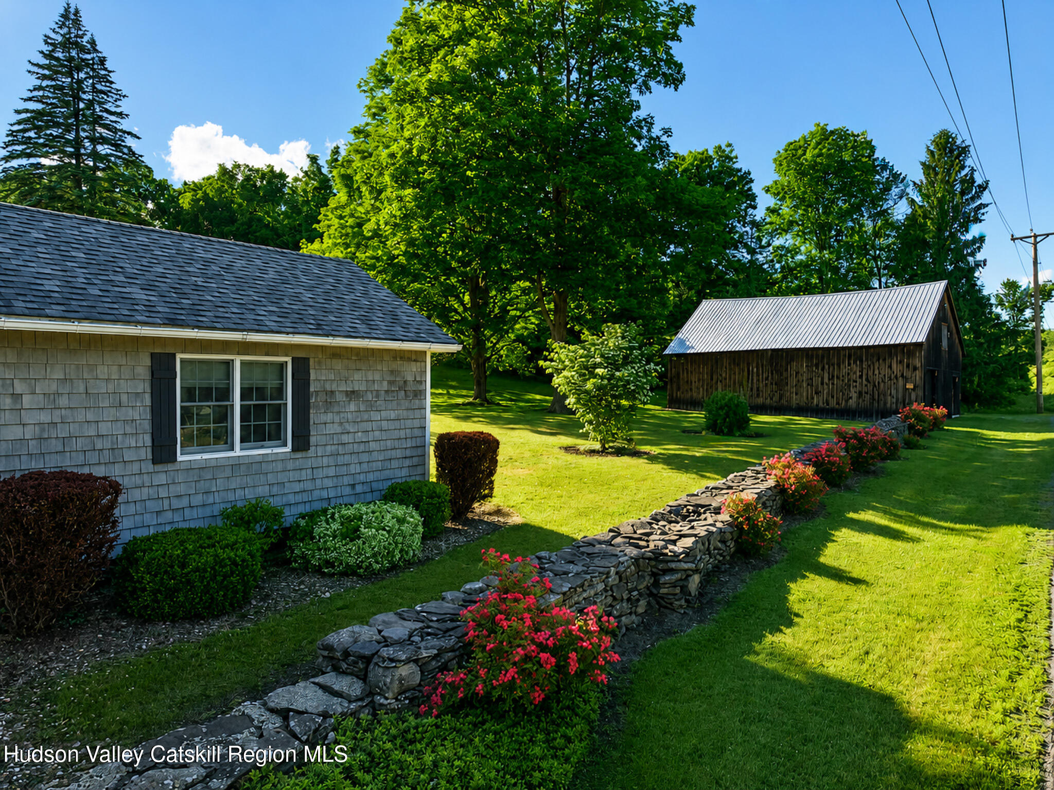 221 Camp Medusa Road Rensselaerville, NY 12120 - Photo 55 of 57 a view of a house with swimming pool and garden