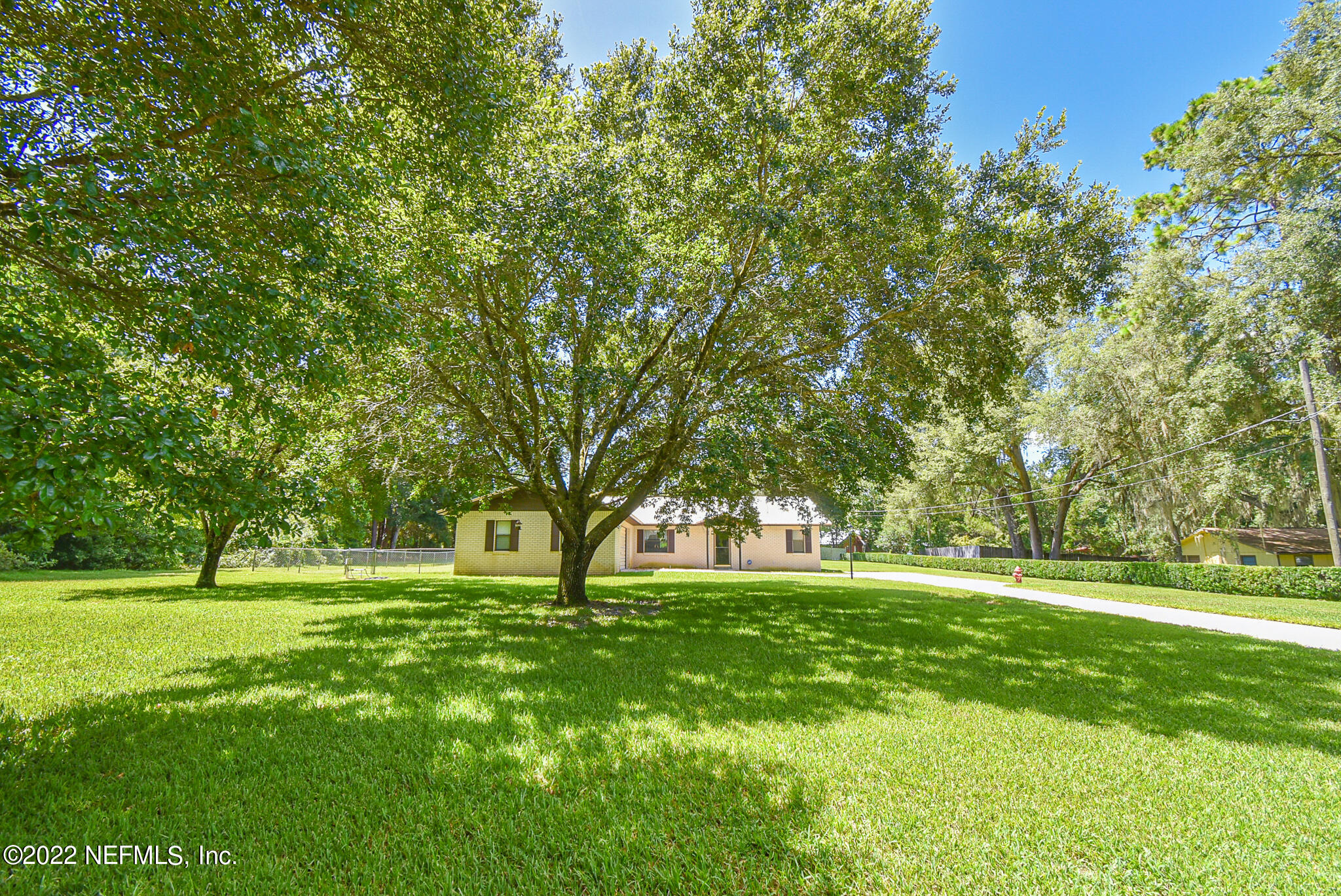 105 Tallow Road Pomona Park, FL 32181 - Photo 1 of 55 a huge green field with lots of trees