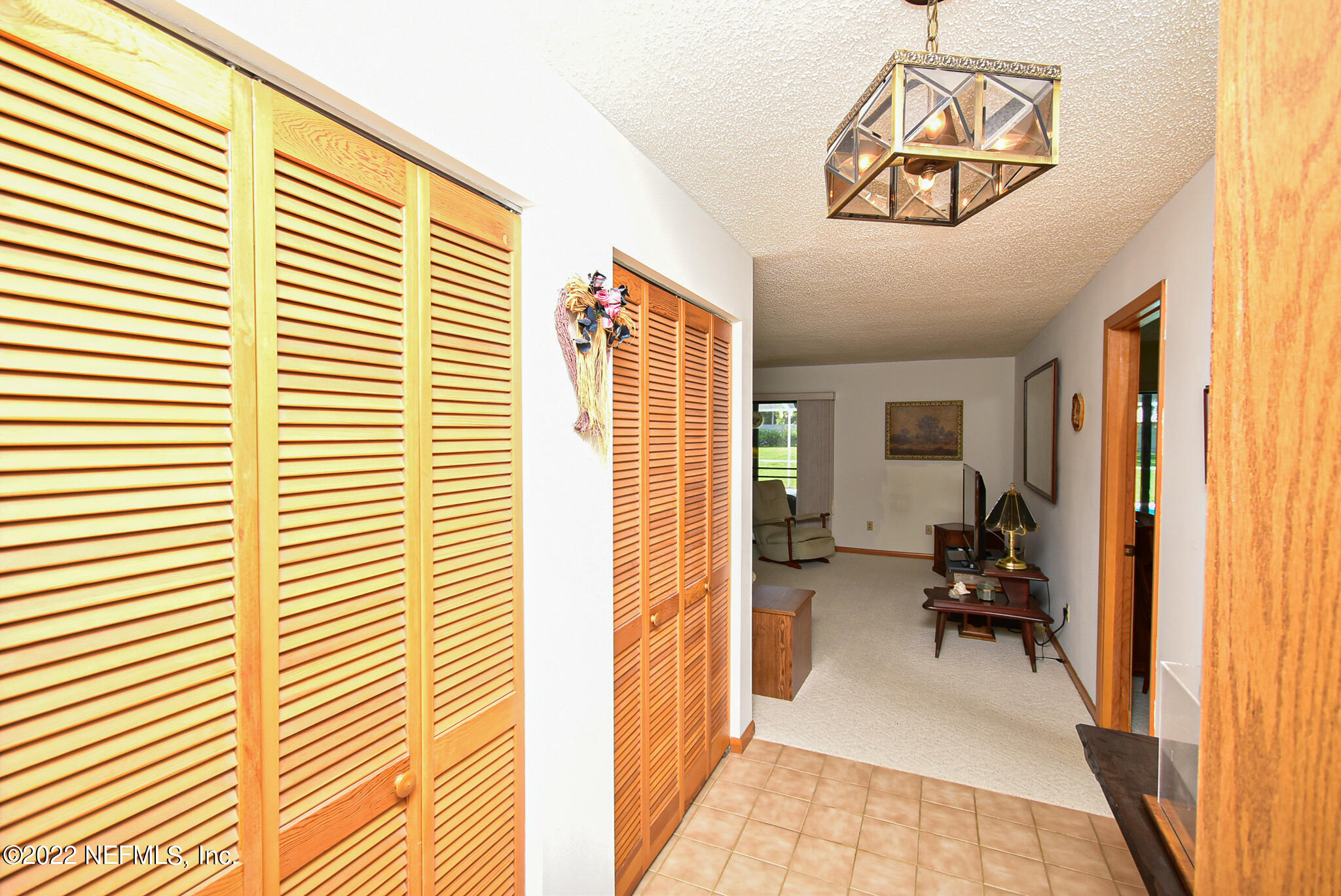 105 Tallow Road Pomona Park, FL 32181 - Photo 11 of 55 a view of a hallway with workspace and a window