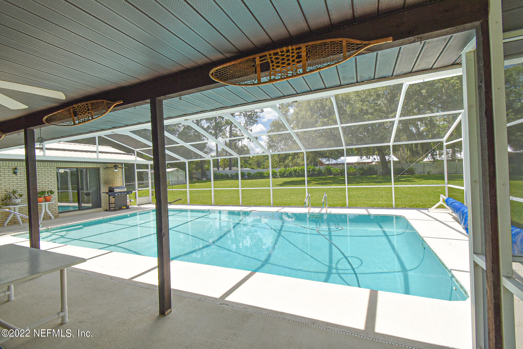 105 Tallow Road Pomona Park, FL 32181 - Photo 20 of 55 a view of an empty room with a floor to ceiling window